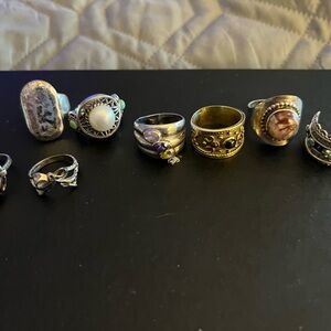 Silver and Gold Rings with Intricate Designs